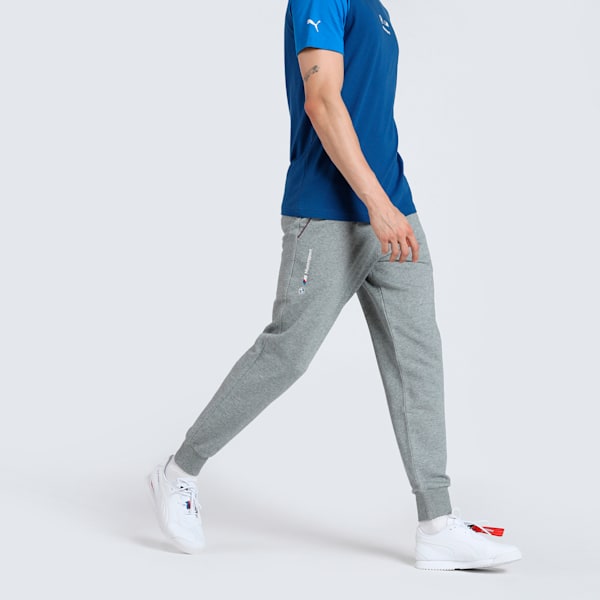 A pair of men’s sweatpants featuring a sleek design with tapered legs, soft fabric, and the signature BMW Motorsport branding for a sporty, casual look