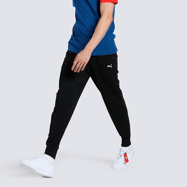 A pair of men’s sweatpants featuring a sleek design with tapered legs, soft fabric, and the signature BMW Motorsport branding for a sporty, casual look