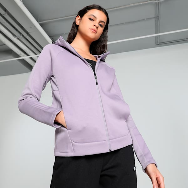 Front view of PUMA Women's Hoodie, highlighting the cozy fabric, relaxed fit, and signature PUMA logo for a stylish and warm winter look.