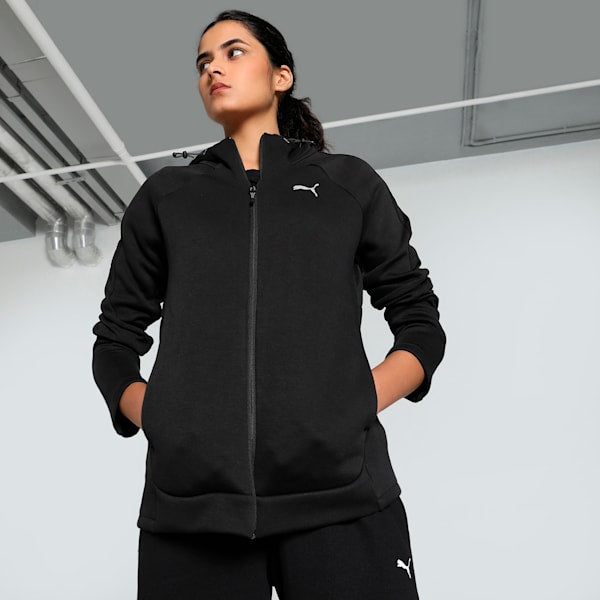 Front view of PUMA Women's Hoodie, highlighting the cozy fabric, relaxed fit, and signature PUMA logo for a stylish and warm winter look.