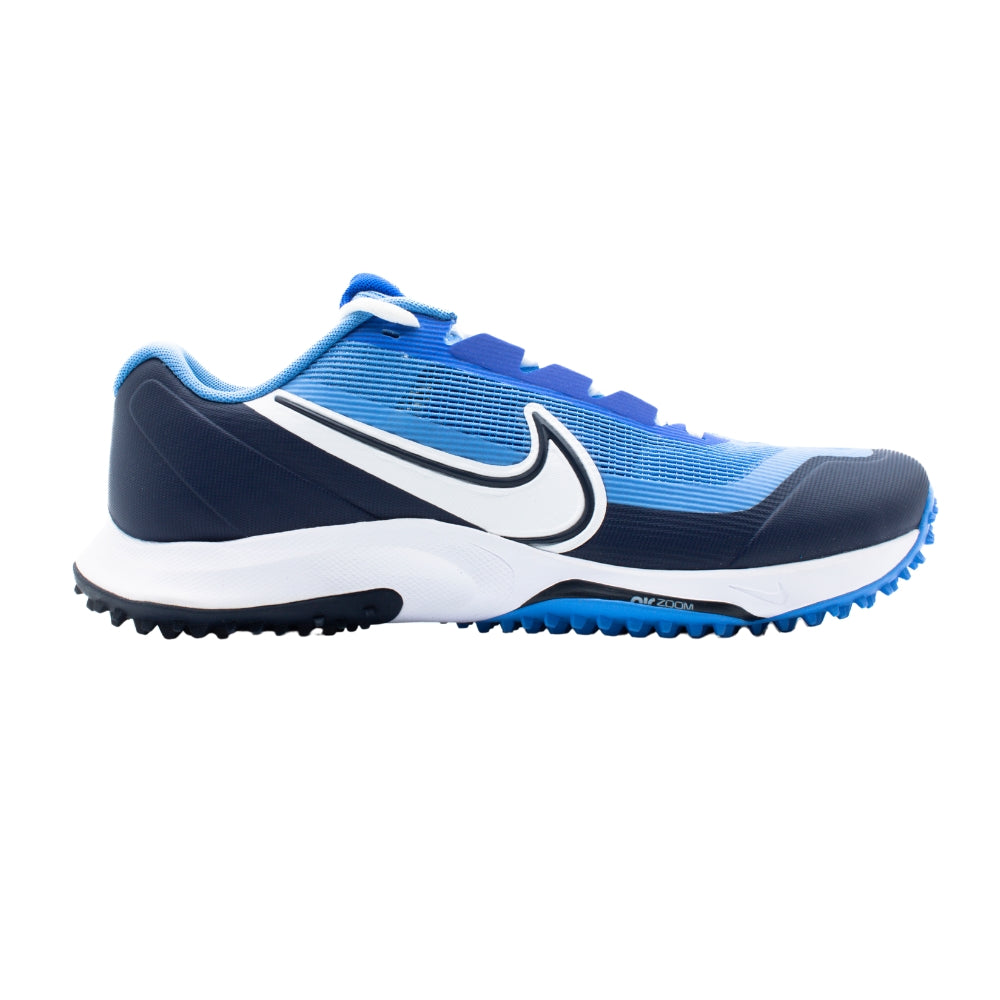 A side-angle view of Nike Vapor Drive 2 field hockey unisex footwear showcasing the water-resistant upper cushioned midsole and traction-focused outsole placed on a clean background.