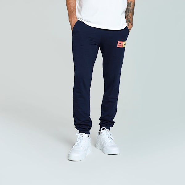 Side view of PUMA Men's Lower, showcasing its relaxed fit, breathable fabric, and signature PUMA logo for a casual, comfortable look.