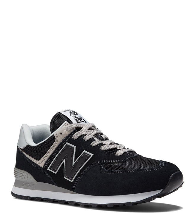 A side-angle view of New Balance men's lifestyle shoes showcasing the retro basketball-inspired design durable leather upper lace-up closure and premium craftsmanship placed on a clean background to highlight their unique features.