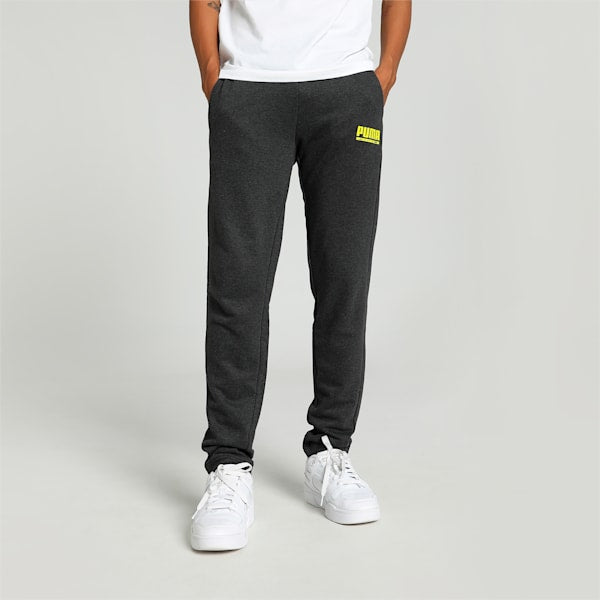 Side view of PUMA Men's Lower, showcasing its relaxed fit, breathable fabric, and signature PUMA logo for a casual, comfortable look.