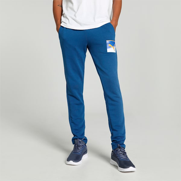 Side view of PUMA Men's Lower, showcasing its relaxed fit, breathable fabric, and signature PUMA logo for a casual, comfortable look.