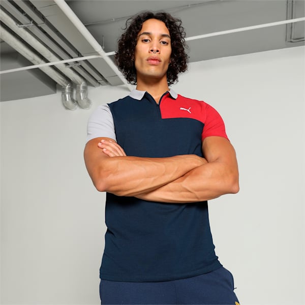 Front view of PUMA Men's Polo, showcasing the classic design, breathable fabric, and signature PUMA branding for a stylish and casual look.