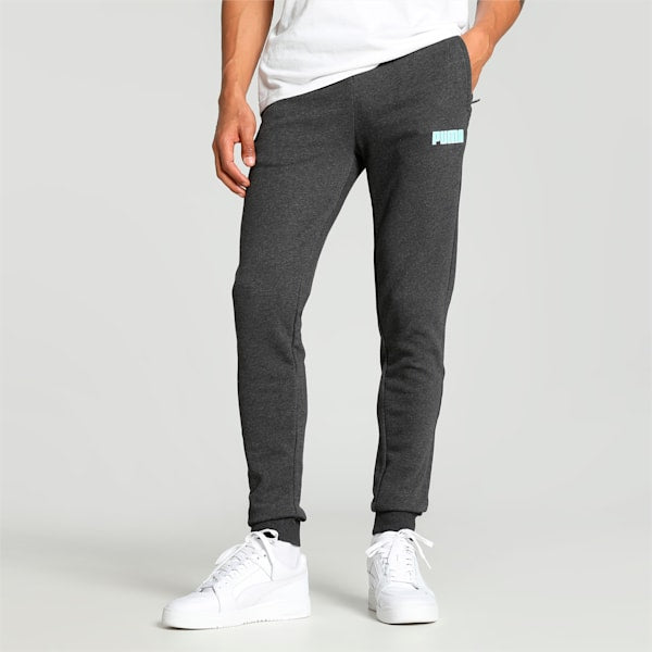 Side view of PUMA Men's Lower, showcasing its relaxed fit, breathable fabric, and signature PUMA logo for a casual, comfortable look.