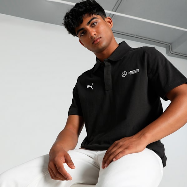 Front view of PUMA Men's Polo, showcasing the classic design, breathable fabric, and signature PUMA branding for a stylish and casual look.