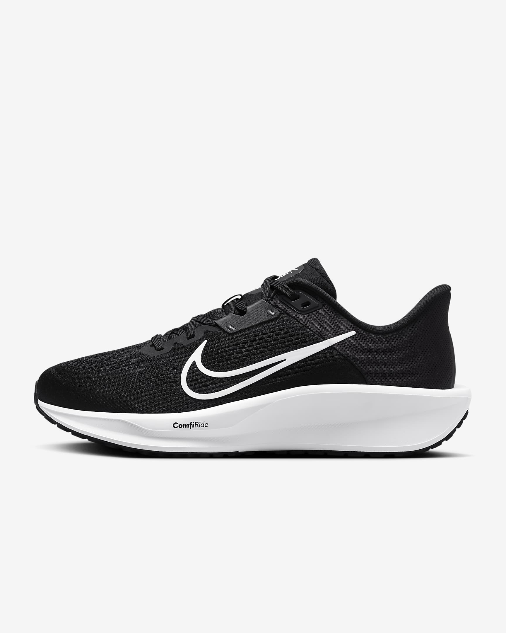 A dynamic side-angle view of Nike men’s lace-up running shoes highlighting the streamlined design, cushioned midsole, and bold Nike swoosh, set against a clean, sporty background