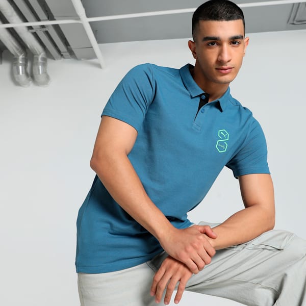 Front view of PUMA Men's Polo, showcasing the classic design, breathable fabric, and signature PUMA branding for a stylish and casual look.