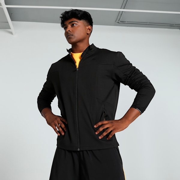 Front view of PUMA Men's Long Sleeve Top, highlighting the cozy fabric, long sleeves, and modern design with signature PUMA branding for winter style.