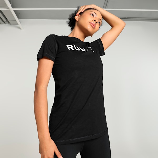 Front view of PUMA Women's Training Crew, showcasing the soft fabric, relaxed fit, ribbed cuffs, and signature PUMA logo, ideal for both workouts and casual wear.