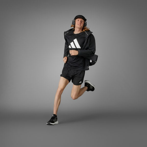 A sleek and high-performance pair of Adidas men's running shorts in classic black, designed for ultimate comfort and mobility. Made from lightweight, breathable fabric, these shorts wick away moisture to keep you cool and dry during intense runs or workouts