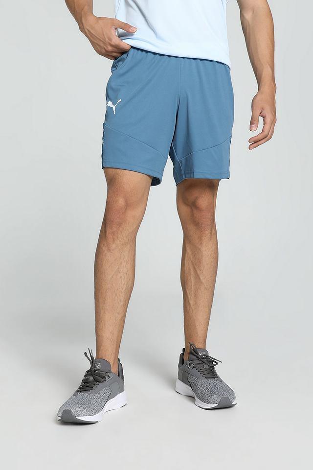 Side view of PUMA Men's Shorts, highlighting the relaxed fit, soft fabric, and signature PUMA logo for a comfortable and stylish casual look.