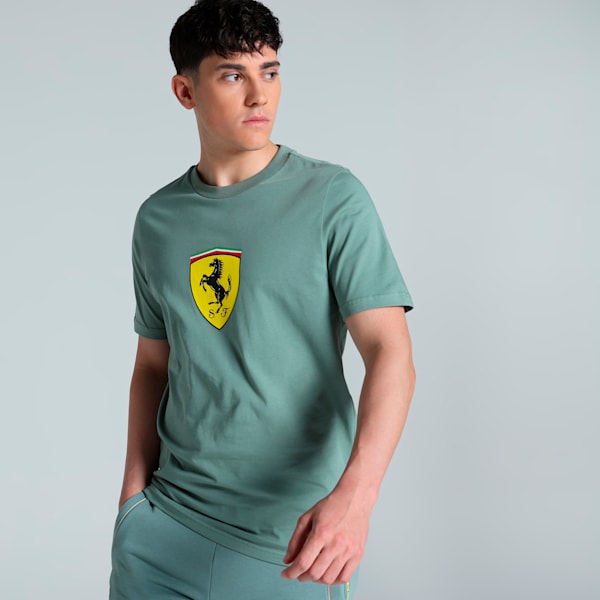 A bold men's crewneck tee featuring a large Ferrari Shield logo, soft breathable fabric, and a comfortable fit for everyday motorsport-inspired style