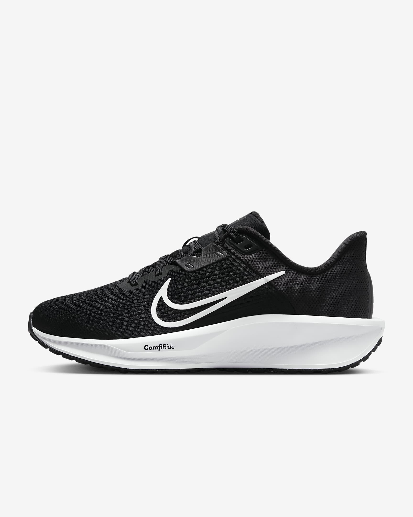 A side-angle view of Nike women’s lace-up running shoes showcasing the sleek profile, cushioned sole, and iconic Nike swoosh, set against a clean background for a modern look