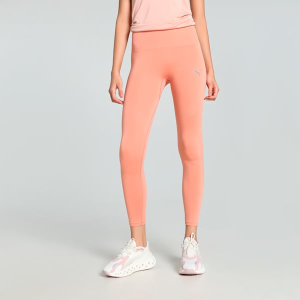 Side view of PUMA Women's Lifestyle Tights, showcasing the stretchy, supportive fit, soft fabric, and signature PUMA logo, designed for comfort and style.