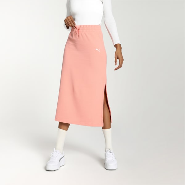 Side view of PUMA Women's Sportstyle Skirt, highlighting the A-line cut, elastic waistband, and signature PUMA logo, designed for a sporty yet stylish look.