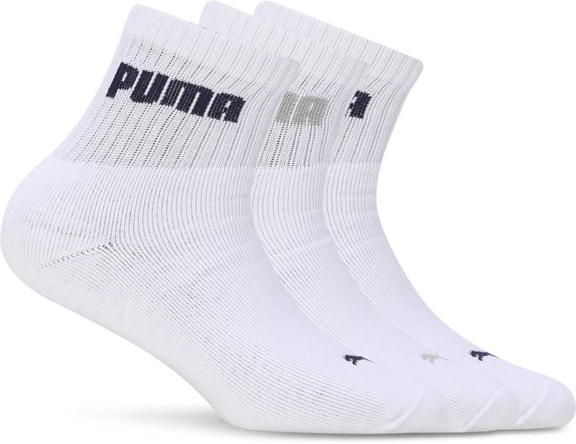 Close-up of PUMA Unisex Lifestyle PO3 Socks, highlighting the soft fabric, reinforced toe and heel areas, and the iconic PUMA logo, designed for comfort and durability in everyday wear.