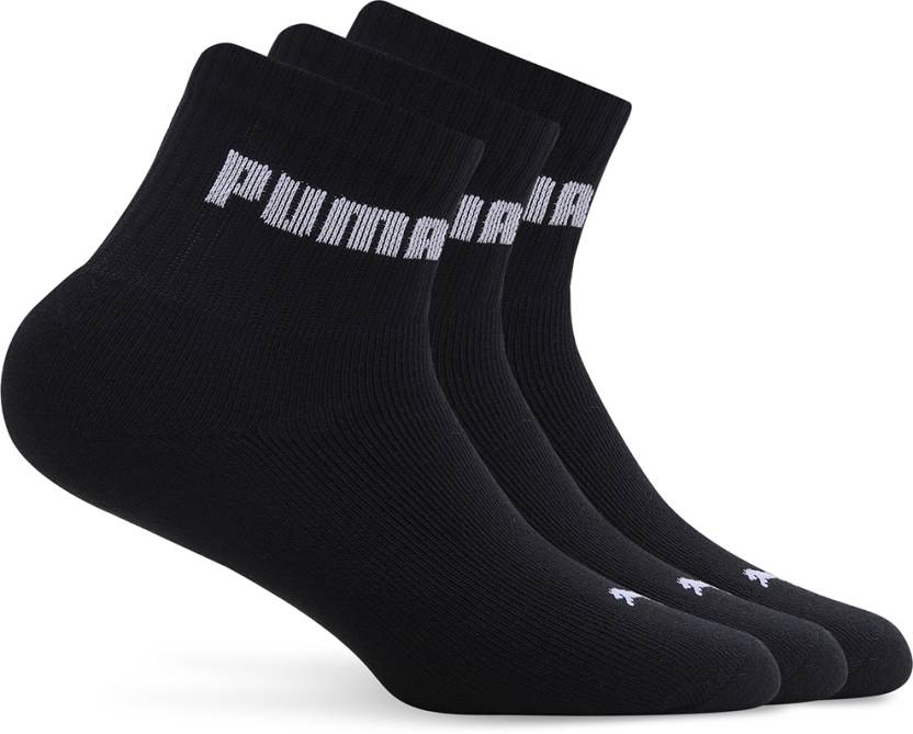 Close-up of PUMA Unisex Lifestyle PO3 Socks, highlighting the soft fabric, reinforced toe and heel areas, and the iconic PUMA logo, designed for comfort and durability in everyday wear.