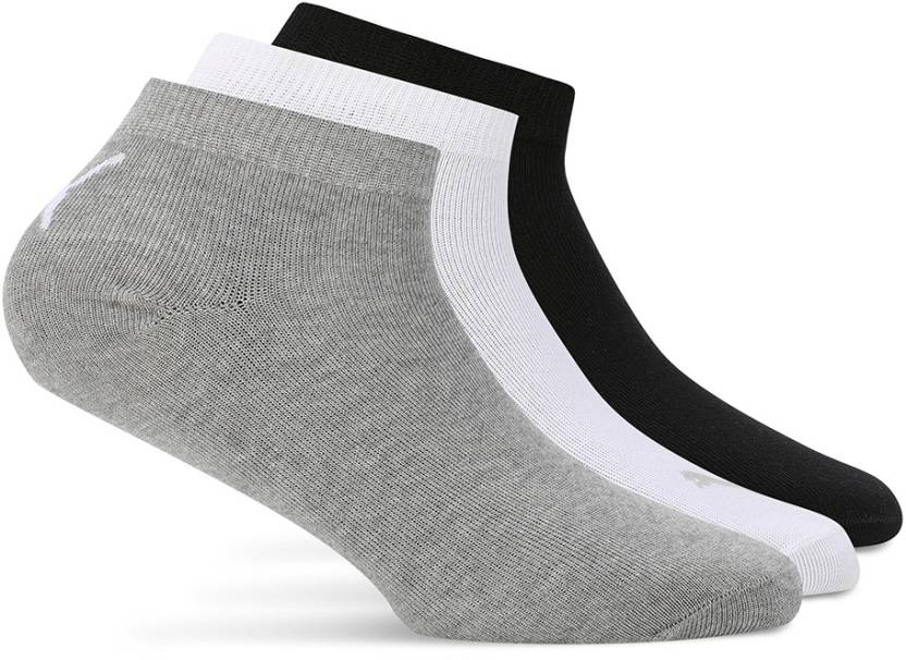 Close-up of PUMA Unisex Lifestyle PO3 Socks, highlighting the soft fabric, reinforced toe and heel areas, and the iconic PUMA logo, designed for comfort and durability in everyday wear.