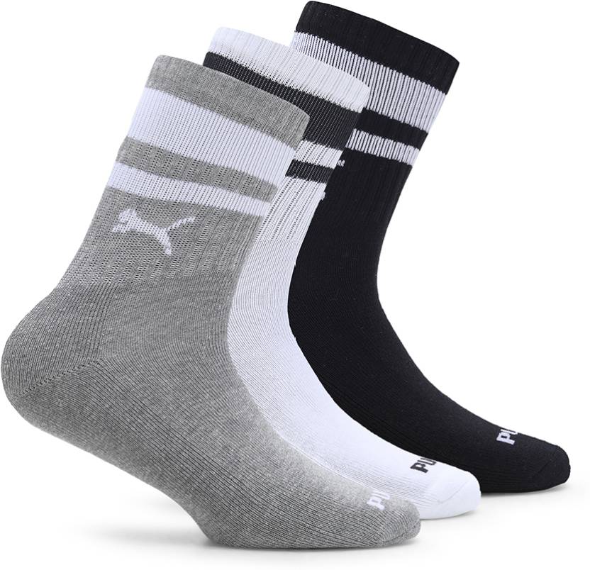 Close-up of PUMA Men's Lifestyle PO3 Socks, highlighting the soft fabric, reinforced toe and heel areas, and the iconic PUMA logo, designed for comfort and durability in everyday wear.