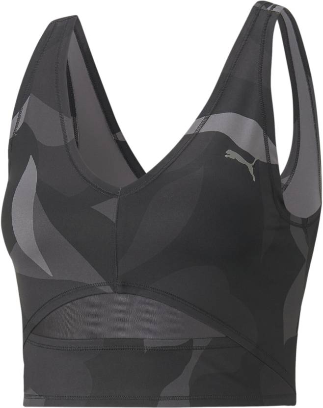 Front view of PUMA WoWomen's Crew, showcasing the sleek, lightweight design and signature PUMA logo, ideal for running and active wear.