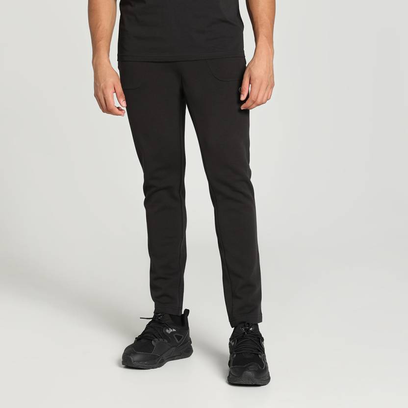 Side view of PUMA Men's Lower, showcasing its relaxed fit, breathable fabric, and signature PUMA logo for a casual, comfortable look.