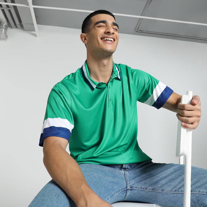 Front view of PUMA Men's Polo, showcasing the classic design, breathable fabric, and signature PUMA branding for a stylish and casual look.