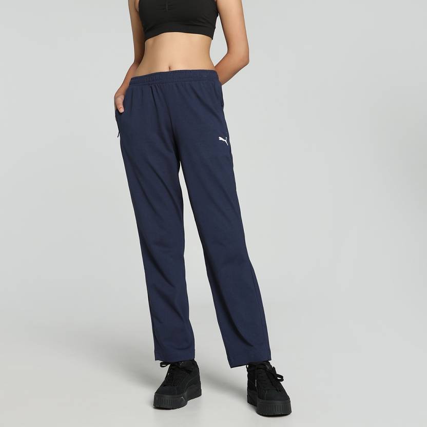 Side view of PUMA Women's Lower, highlighting the relaxed fit, soft fabric, and signature PUMA logo, perfect for casual wear and lifestyle activities.