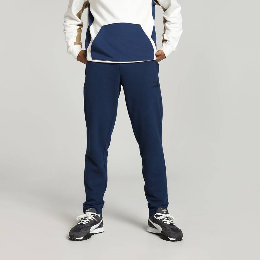 Side view of PUMA Men's Lower, showcasing its relaxed fit, breathable fabric, and signature PUMA logo for a casual, comfortable look.