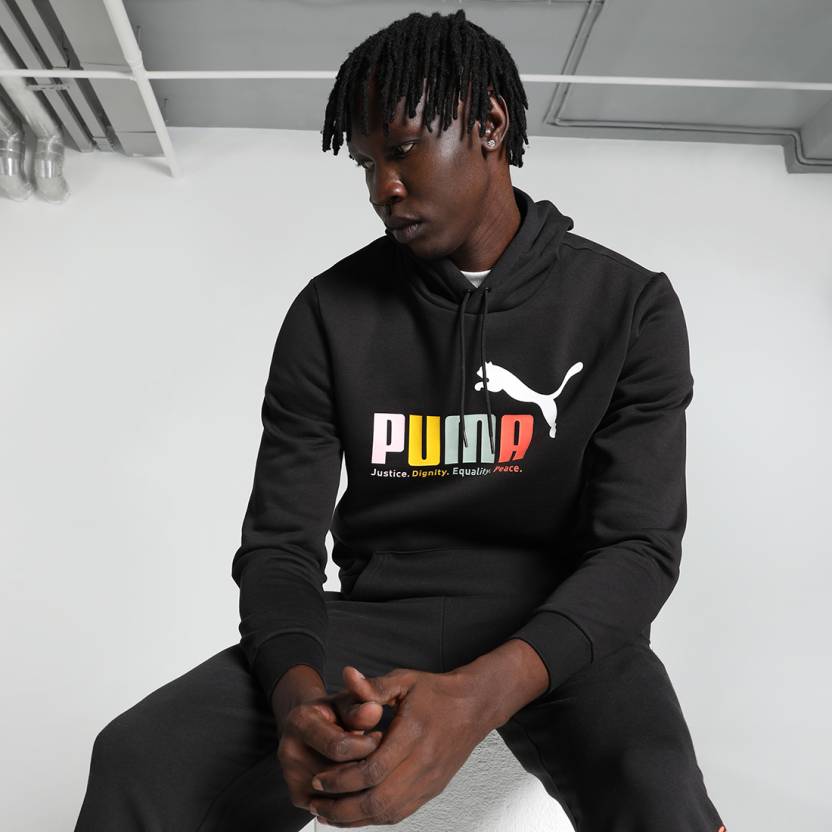 Front view of PUMA Men's Sweatshirt, showcasing the relaxed fit, soft fabric, and iconic PUMA logo for a modern and comfortable lifestyle look.