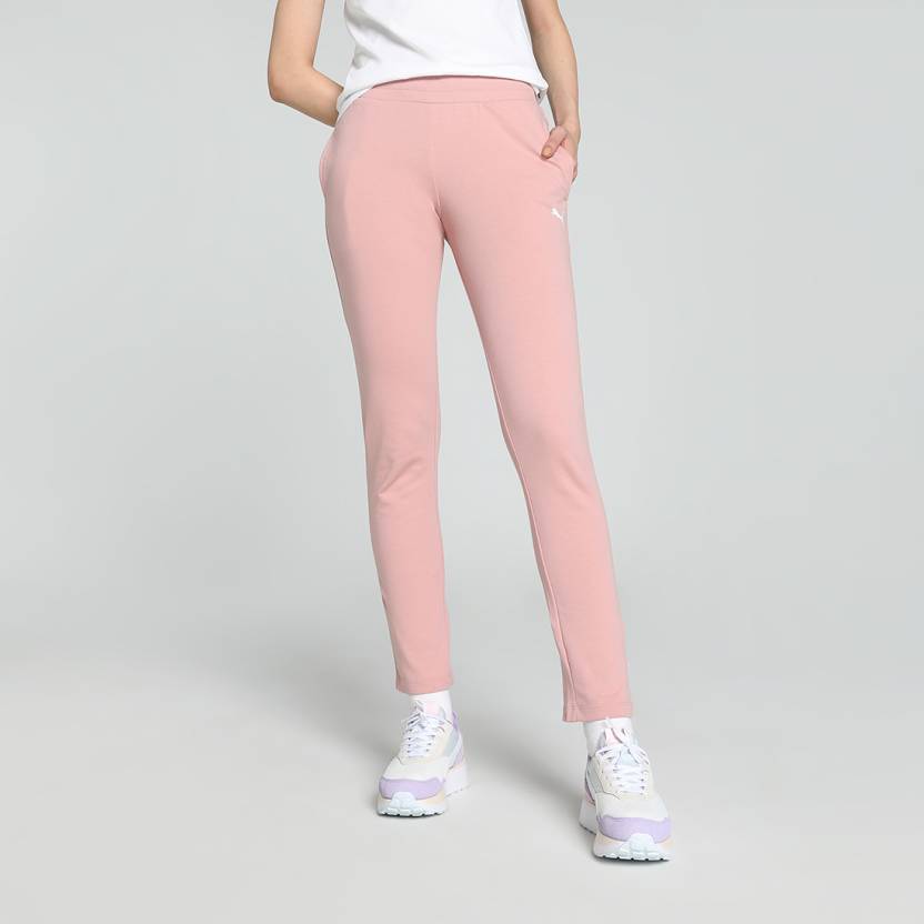 Side view of PUMA Women's Lower, highlighting the relaxed fit, soft fabric, and signature PUMA logo, perfect for casual wear and lifestyle activities.