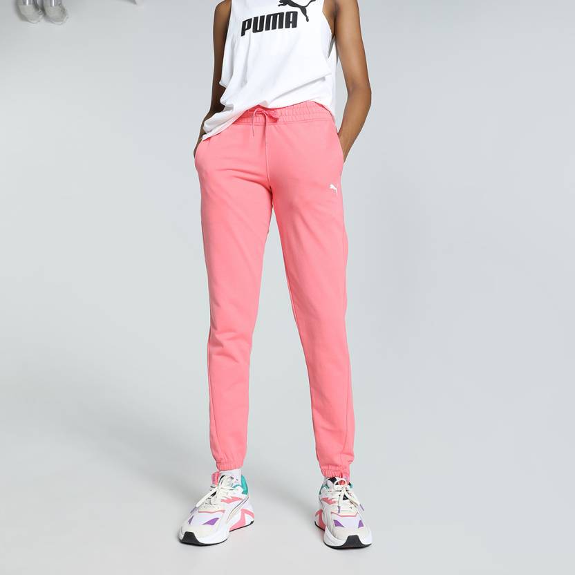 Side view of PUMA Women's Lower, highlighting the relaxed fit, soft fabric, and signature PUMA logo, perfect for casual wear and lifestyle activities.