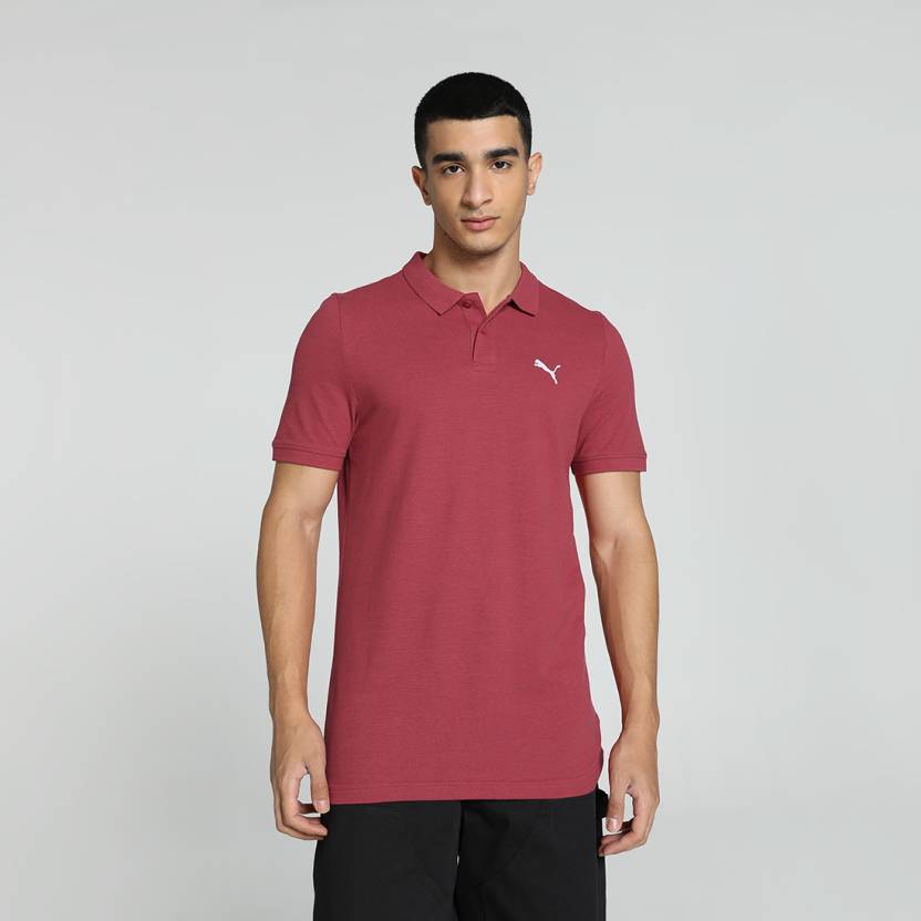 Front view of PUMA Men's Polo, showcasing the classic design, breathable fabric, and signature PUMA branding for a stylish and casual look.