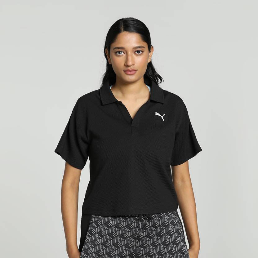 Front view of PUMA Women's Polo, highlighting the soft fabric, sleek fit, and signature PUMA logo, designed for casual and active wear.