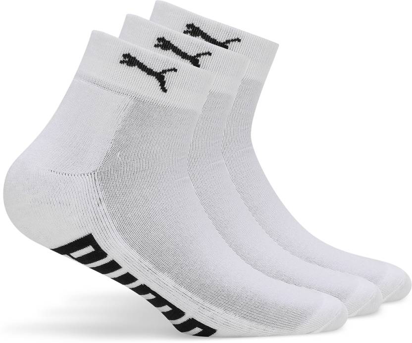 Close-up of PUMA Men's Lifestyle PO3 Socks, highlighting the soft fabric, reinforced toe and heel areas, and the iconic PUMA logo, designed for comfort and durability in everyday wear.