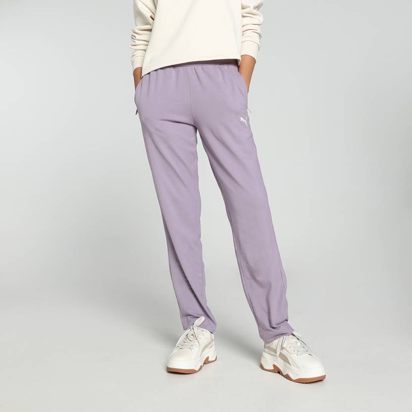 Side view of PUMA Women's Lower, highlighting the relaxed fit, soft fabric, and signature PUMA logo, perfect for casual wear and lifestyle activities.