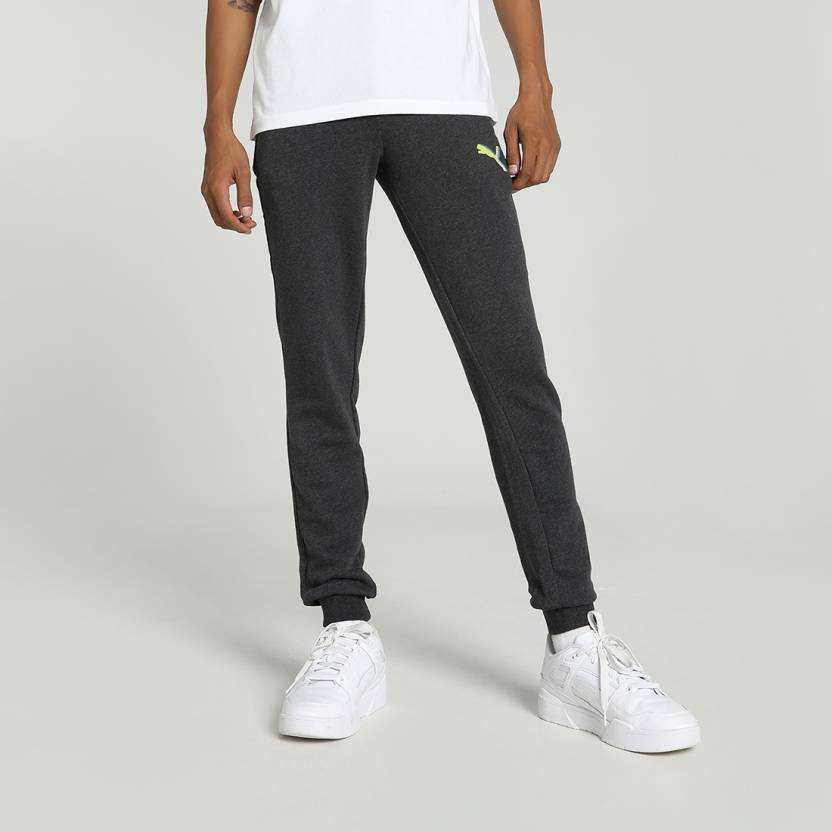 Side view of PUMA Men's Lower, showcasing its relaxed fit, breathable fabric, and signature PUMA logo for a casual, comfortable look.