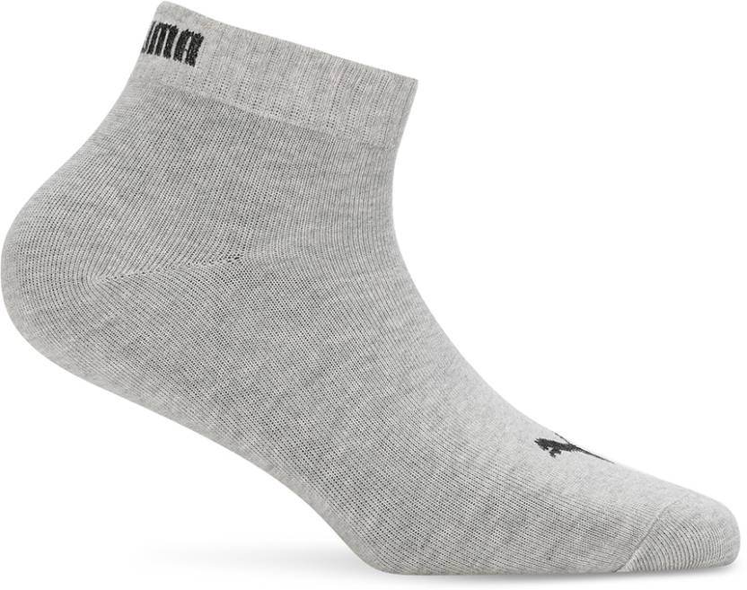 Close-up view of PUMA Unisex Lifestyle PO1 Socks, highlighting the soft fabric, snug fit, and iconic PUMA logo, designed for comfort and durability during everyday wear.