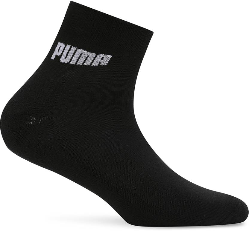 Close-up view of PUMA Unisex Lifestyle PO1 Socks, highlighting the soft fabric, snug fit, and iconic PUMA logo, designed for comfort and durability during everyday wear.