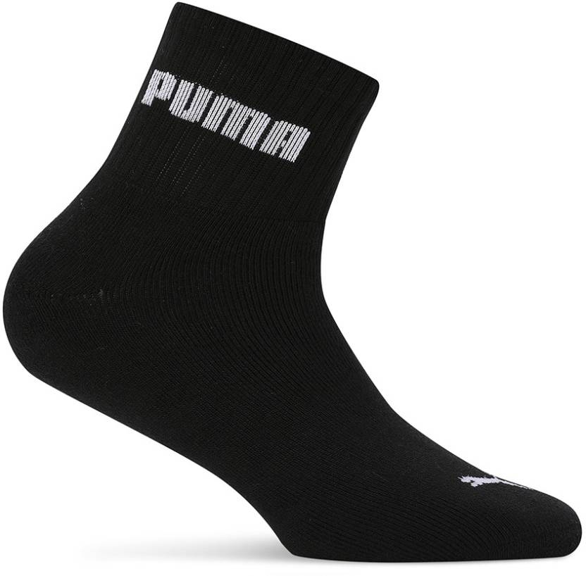 Close-up view of PUMA Men's Lifestyle PO1 Socks, highlighting the soft fabric, snug fit, and iconic PUMA logo, designed for comfort and durability during everyday wear.