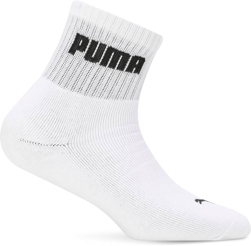 Close-up view of PUMA Unisex Lifestyle PO1 Socks, highlighting the soft fabric, snug fit, and iconic PUMA logo, designed for comfort and durability during everyday wear.