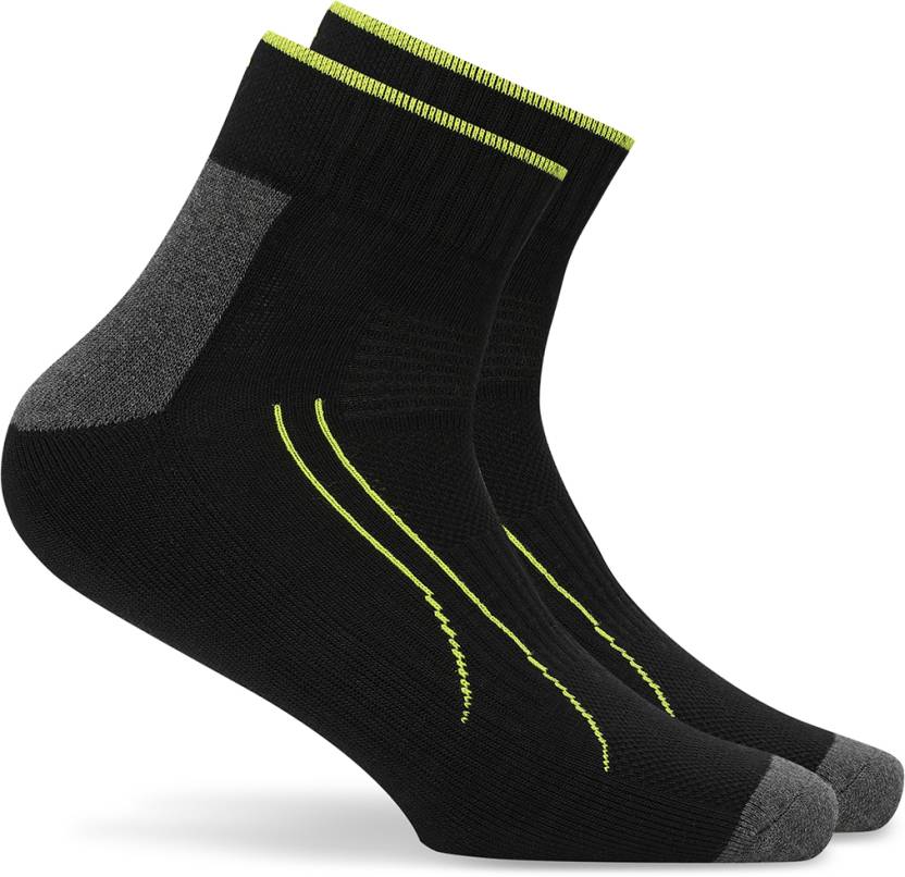 Side view of PUMA Men's Lifestyle PO2 Socks, showcasing the soft fabric, reinforced heels and toes, and iconic PUMA logo, designed for comfort and durability.