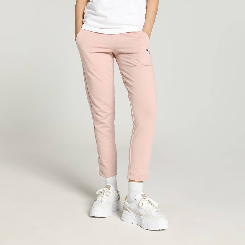 Side view of PUMA Women's Lower, highlighting the relaxed fit, soft fabric, and signature PUMA logo, perfect for casual wear and lifestyle activities.