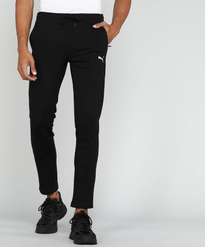 Side view of PUMA Men's Lower, showcasing its relaxed fit, breathable fabric, and signature PUMA logo for a casual, comfortable look.