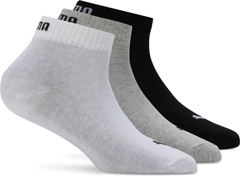 Side view of PUMA Unisex PO2 Socks, highlighting the soft fabric, reinforced toe and heel areas, and the iconic PUMA logo, designed for comfort and durability in everyday wear.