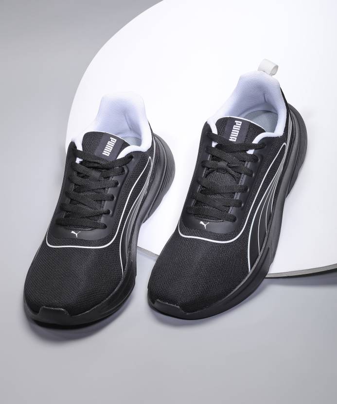 Side view of PUMA Men's Lifestyle Lace-Up Sneakers, showcasing the sleek design, breathable upper, cushioned insole, and iconic PUMA logo, designed for comfort and style in everyday wear.