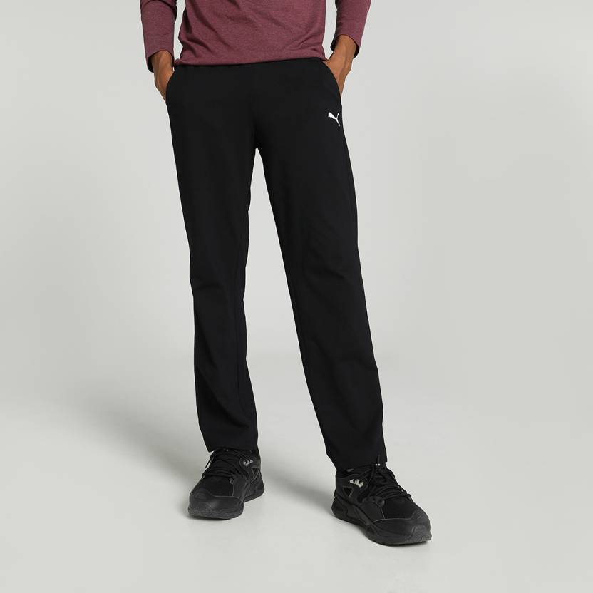 Side view of PUMA Men's Lower, showcasing its relaxed fit, breathable fabric, and signature PUMA logo for a casual, comfortable look.