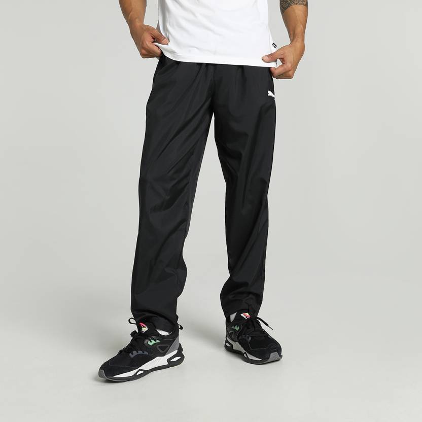 Side view of PUMA Men's Lower, showcasing its relaxed fit, breathable fabric, and signature PUMA logo for a casual, comfortable look.